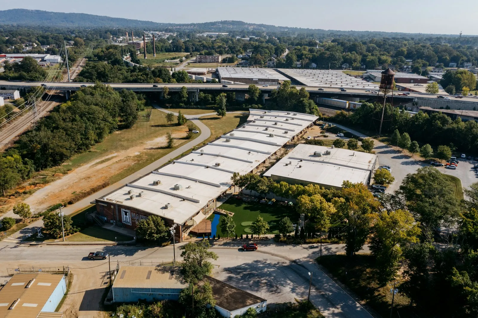 Aerial view of industrial buildings in open landscape